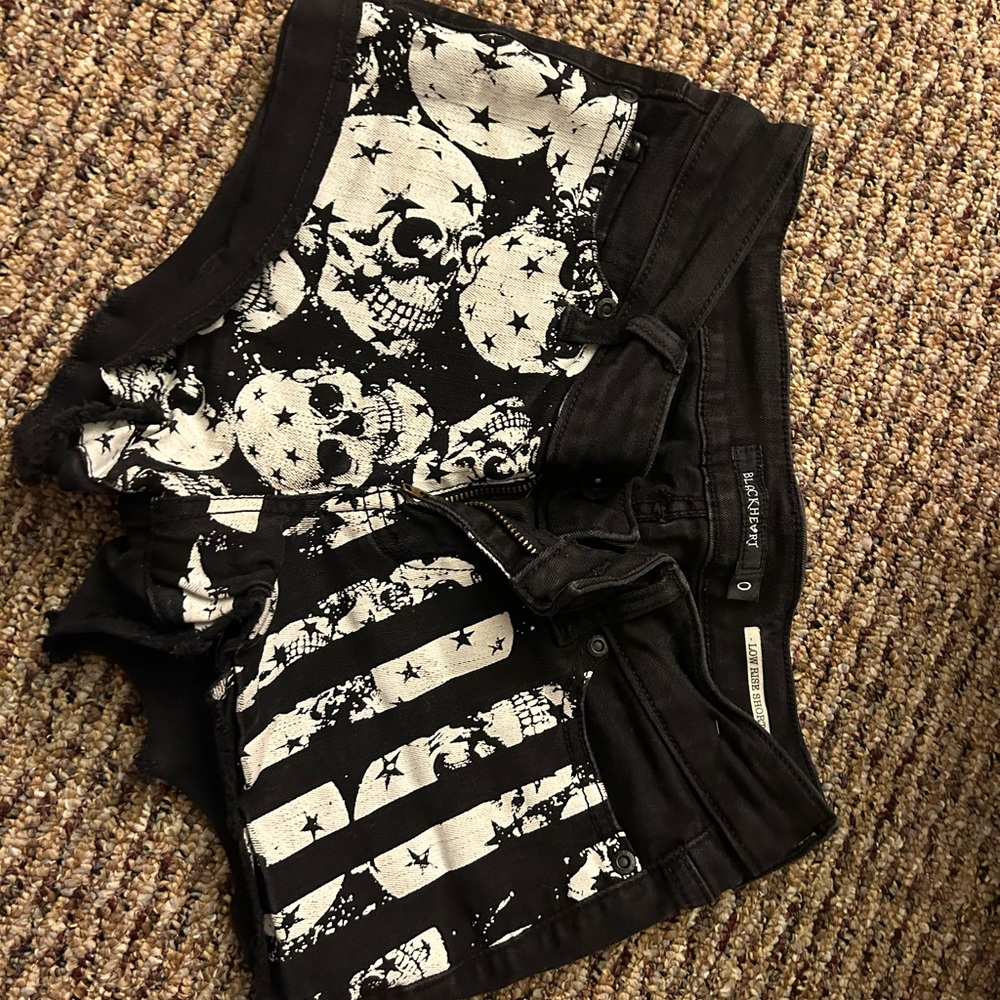 black and white skull design shorts fairly worn